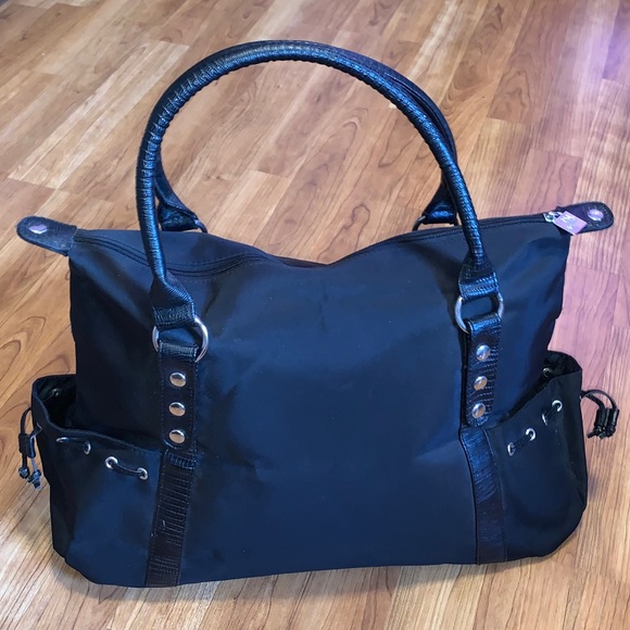 Lancome Handbags - Lancome Studded Travel Bag 👜